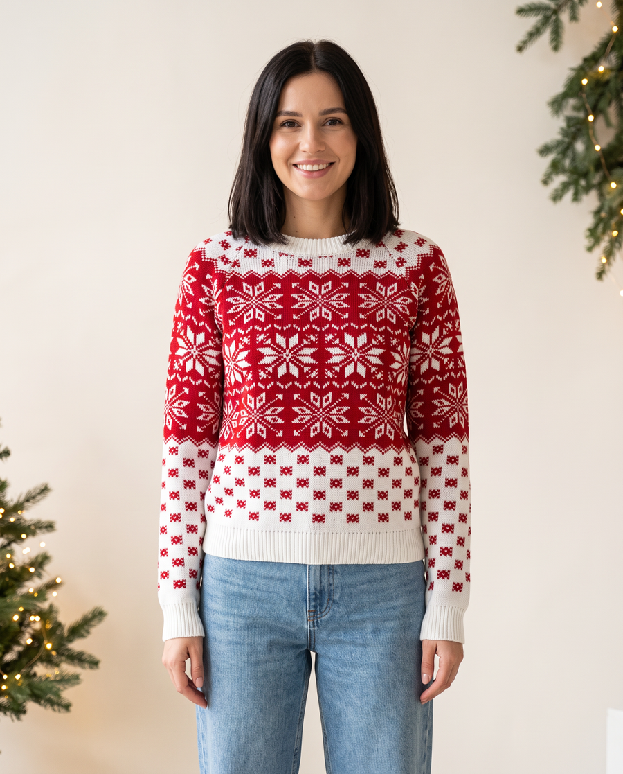 Woman wearing a red and white snowflake knit Christmas sweater