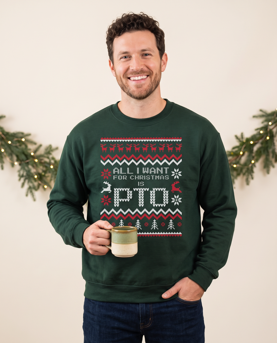 Man holding a mug and wearing a green 'All I want for Christmas is PTO' sweatshirt